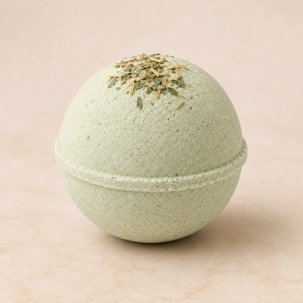Cucumber Melon luxury bath bomb with dried herbs on ivory background