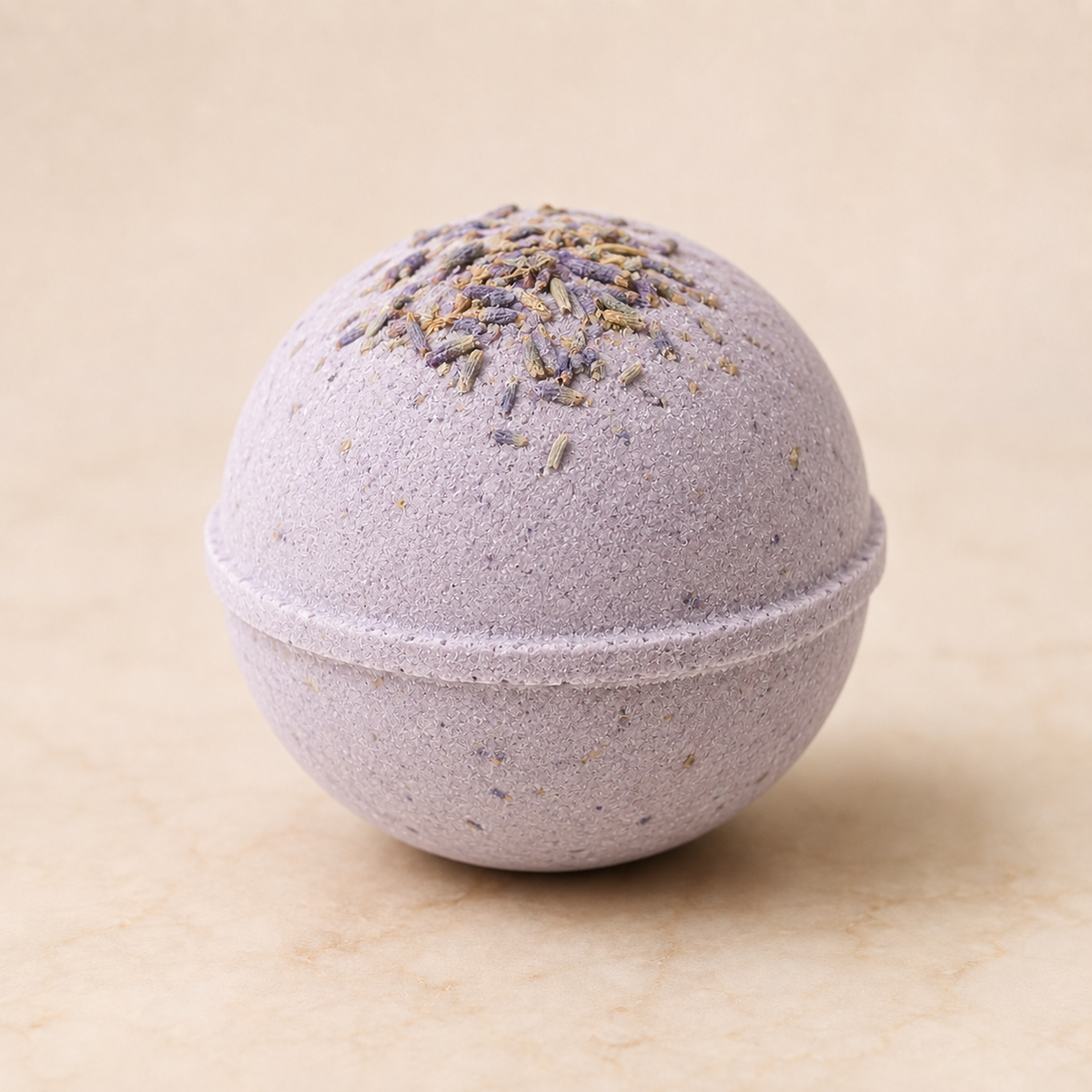 Lavender Lux luxury bath bomb with dried lavender on ivory background