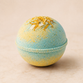 Tropical Fusion luxury bath bomb with dried flowers on ivory background